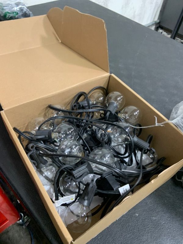 Photo 1 of Brightown Outdoor String Lights 25FT G40 Globe Patio Lights with 27 Edison Glass Bulbs(2 Spare), Waterproof Connectable Hanging Light for Backyard Porch Balcony Party Decor, E12 Socket Base, Black