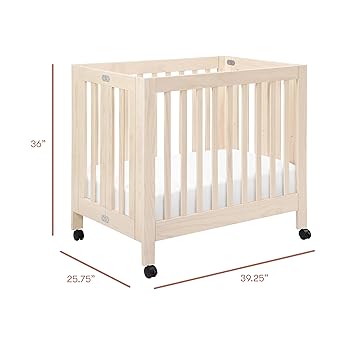 Photo 1 of Babyletto Origami Mini Portable Crib Folding with Wheels in Washed Natural, 2 Adjustable Mattress Positions, Greenguard Gold Certified