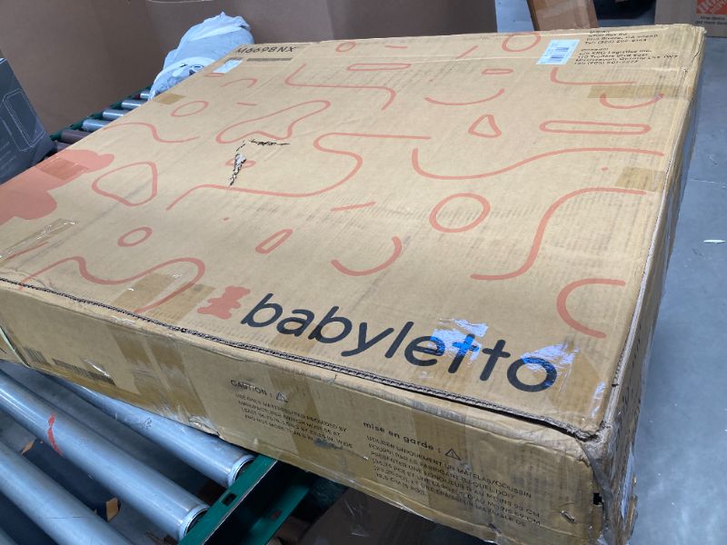 Photo 1 of Babyletto Origami Mini Portable Crib Folding with Wheels in Washed Natural, 2 Adjustable Mattress Positions, Greenguard Gold Certified