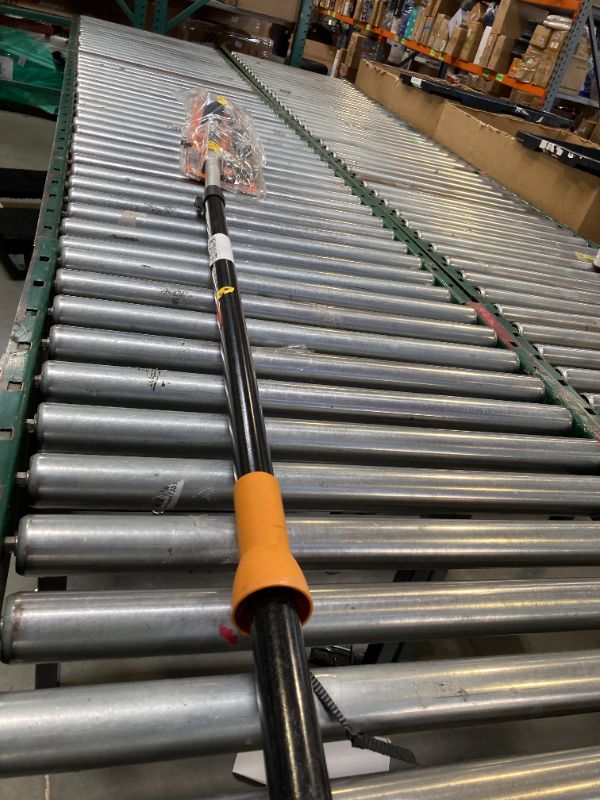 Photo 1 of Fiskars 2-in-1 Extendable Tree Pruner and Pole Saw (Extends 7.9 - 12 feet) with Rotating Head, Pruning Stik Model with15-Inch Double-Grind Saw Blade, and Double Locking System