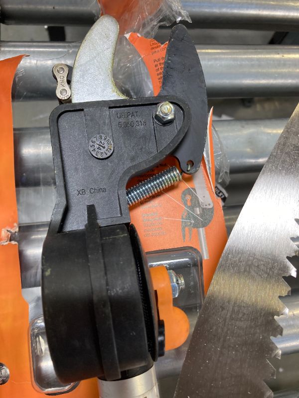 Photo 1 of Fiskars 2-in-1 Extendable Tree Pruner and Pole Saw (Extends 7.9 - 12 feet) with Rotating Head, Pruning Stik Model with15-Inch Double-Grind Saw Blade, and Double Locking System