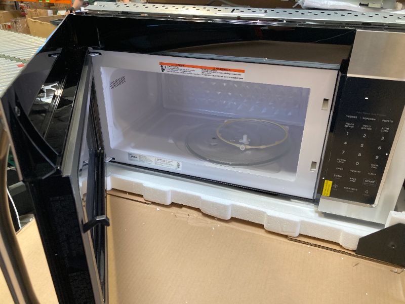 Photo 1 of Midea MOR17BSA-SS 1.7 Cu.ft. Over The Range Microwave Oven with Smart Touch Panel, Auto Cooking Menu, 1000 W, 300 CFM Ventilation, in Stainless Steel