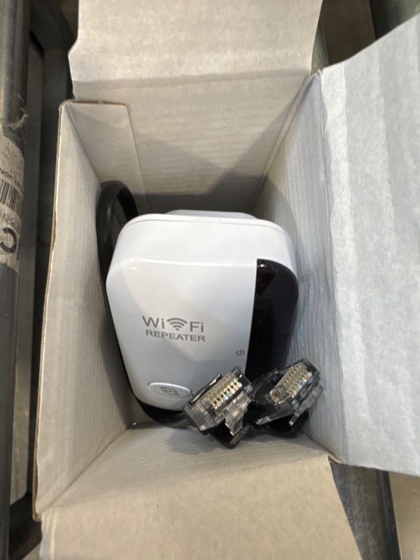 Photo 1 of WiFi Extender Booster,WiFi Signal Booster,Internet Coverage Up to 3000 Sq.Ft! Works with 45+ Devices & Features Easy Setup,2.4GHz Band WiFi Extender, and LAN Port (White)