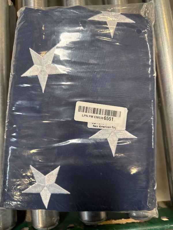 Photo 1 of 5x8 Ft American US Country Flag: Features Embroidered Stars, Sewn Stripes, and is Suitable for Indoor/Outdoor Use. Equipped with Brass Grommets, it's Heavy - Duty and Designed for All - Weather Conditions