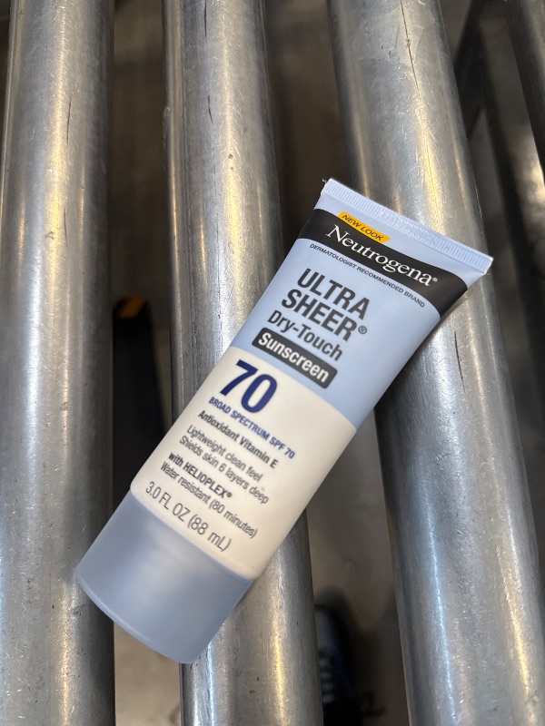 Photo 1 of Neutrogena Ultra Sheer Dry-Touch Water Resistant and Non-Greasy Sunscreen Lotion with Broad Spectrum SPF 70, 3 Fl Oz (Pack of 1)