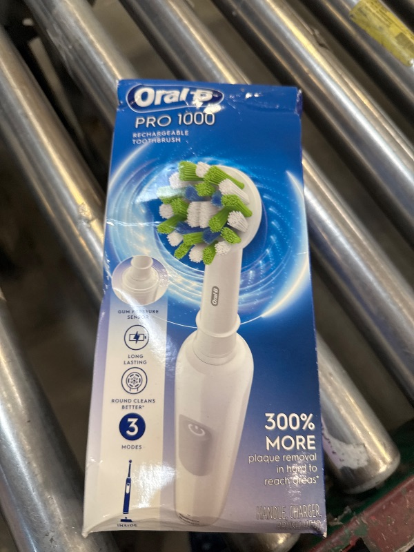 Photo 1 of Oral-B Pro 1000 Rechargeable Electric Toothbrush, White
