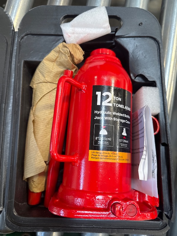 Photo 1 of Torin Hydraulic Bottle Jack with Carrying Case, 12 Ton (26,455 lb) Capacity 7.5-14 inch Lifting Range, Muti-Directional Welded Bottle Car Jack for Car, Truck, RV, Pickup Truck, Auto Repair
