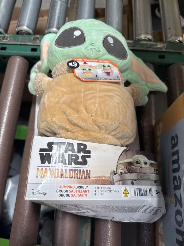 Photo 1 of Mattel Star Wars Jumping Grogu Plush Toy with Jump Action & Sounds, Soft Doll Inspired by Star Wars Mandalorian Book of Boba Fett