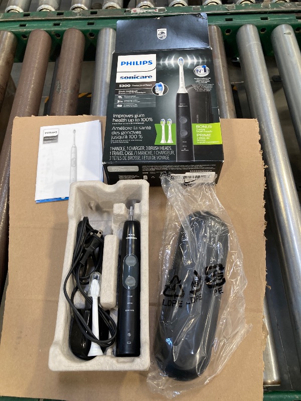 Photo 1 of Philips Sonicare ProtectiveClean 5300 Rechargeable Electric Toothbrush, with Pressure Sensor, 3 Cleaning Modes, SmarTimer and QuadPacer, with 2 Bonus Brush Heads, Travel Case, Black, Model HX6423/34