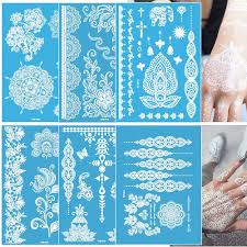 Photo 1 of Blue Glow Temporary Tattoos Glow in the Dark Tattoo Kit 