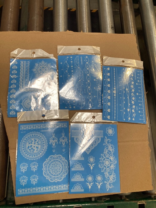 Photo 1 of Blue Glow Temporary Tattoos Glow in the Dark Tattoo Kit 