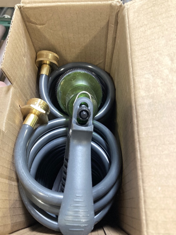 Photo 1 of Coil Hose 50FT EVA Coil Garden Hose With 3/4'' Brass Connector Coiled Water Hose Lightweight And No Kink Includes 7 Patterns Spray Nozzle For Outdoors Lawn Watering Car Washing