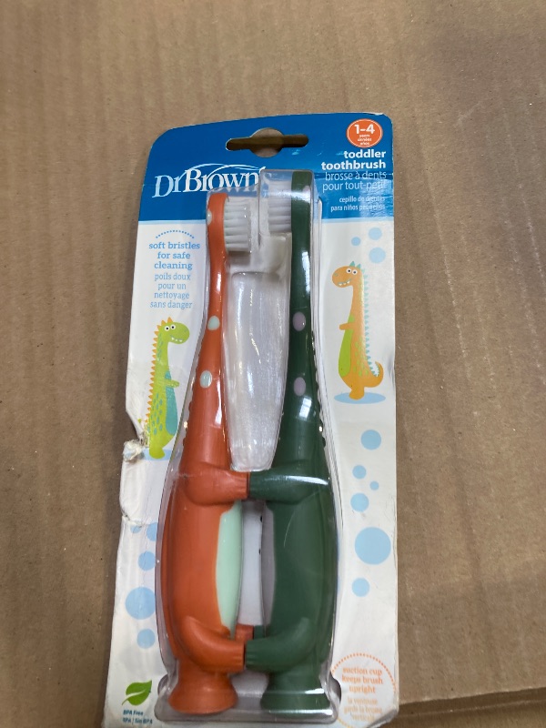 Photo 1 of Dr. Brown's Toddler Toothbrush, Dinosaur, Green and Orange, 2-Pack