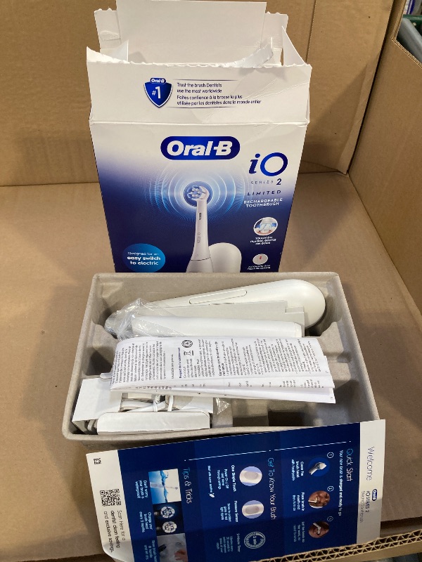 Photo 1 of Oral-B iO Simple Clean Rechargeable Electric Powered Toothbrush, Pure White with 1 Gentle Care Brush Head and 1 White Travel Case - Automatic Pressure Sensor to Protect Gums - 3 Modes -2 Min Timer