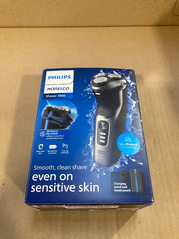 Photo 1 of Philips Norelco Shaver 3900 Series, Wet and Dry Electric Shaver, P-Cap, Travel Pouch, Charging Stand, Storm Blue, Model S3341/92