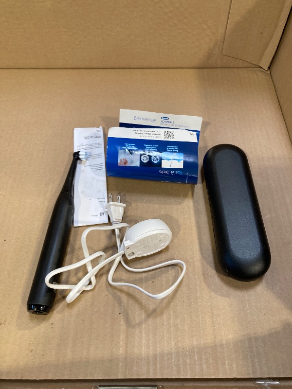 Photo 1 of Oral-B iO Simple Clean Rechargeable Electric Powered Toothbrush, Night Black with 1 Gentle Care Brush Head and 1 Black Travel Case - Automatic Pressure Sensor to Protect Gums - 3 Modes - 2 Min Timer