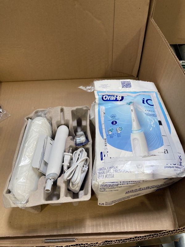 Photo 1 of Oral-B iO Deep Clean Rechargeable Electric Powered Toothbrush, White with iO Series 3 Limited, 2 Brush Heads and Travel Case - Pressure Sensor to Protect Gums - 3 Cleaning Settings - 2 Minute Timer