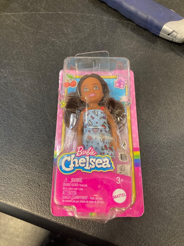 Photo 1 of Barbie Chelsea Doll, Small Doll Wearing Removable Blue Dress with Colorful Print & Pink Shoes, Brown Hair & Green Eyes