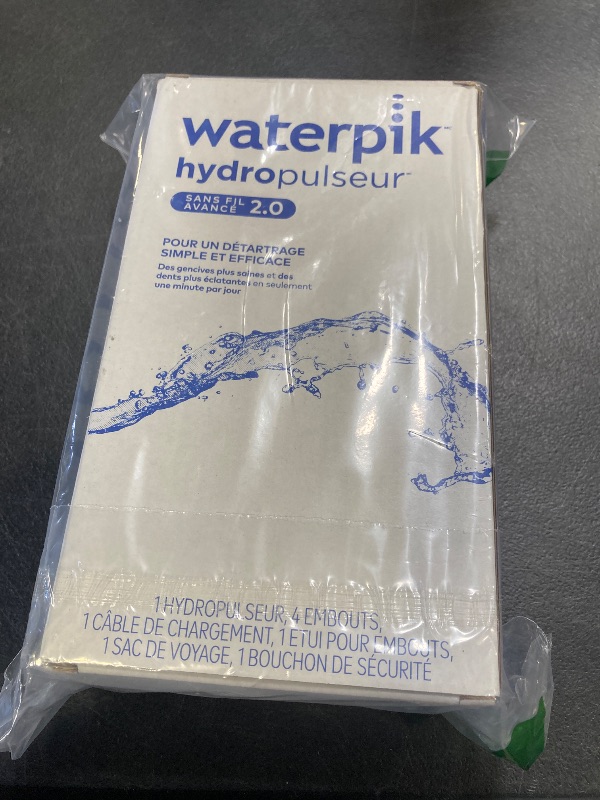 Photo 1 of Waterpik Cordless Advanced 2.0 Water Flosser For Teeth, Gums, Braces, Dental Care With Travel Bag and 4 Tips, ADA Accepted, Rechargeable, Portable, and Waterproof, White WP-580, Packaging May Vary