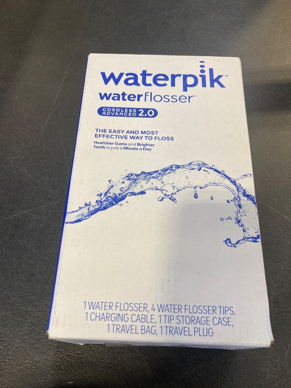 Photo 1 of Waterpik Cordless Advanced 2.0 Water Flosser For Teeth, Gums, Braces, Dental Care With Travel Bag and 4 Tips, ADA Accepted, Rechargeable, Portable, and Waterproof, White WP-580, Packaging May Vary