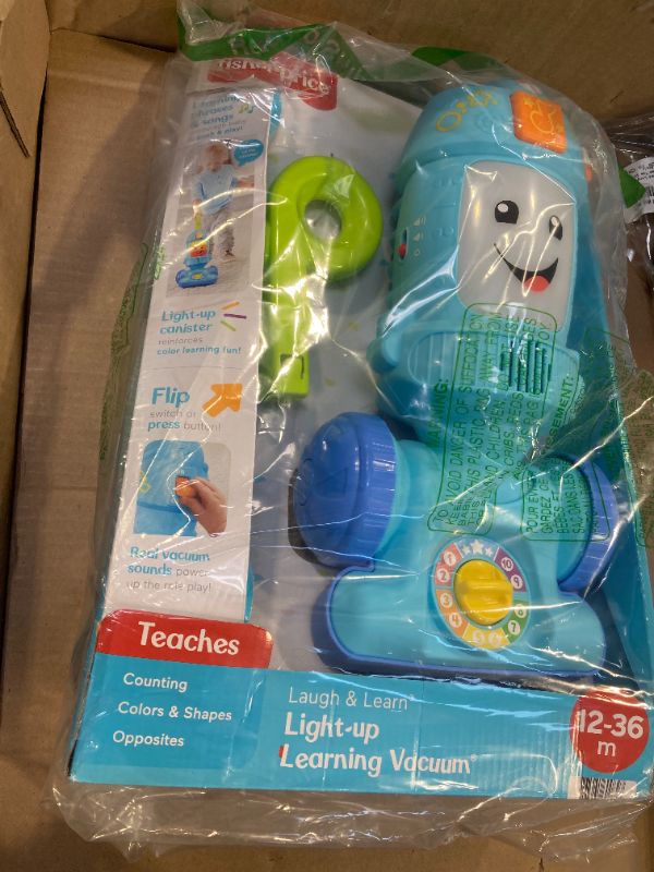 Photo 1 of Fisher-Price Toddler Toy Laugh & Learn Light-Up Learning Vacuum Musical Push Along for Pretend Play Infants Ages 1+ Years?