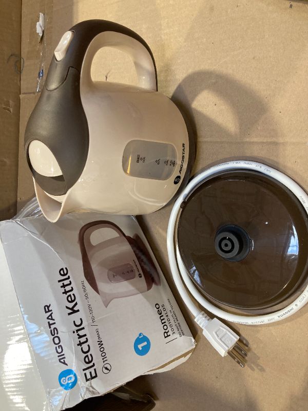 Photo 1 of Aigostar Small Electric Kettle, 1L Portable Electric Tea Kettle 1100W with Automatic Shut-Off and Boil Dry Protection, Travel Hot Water Boiler Cordless for Making Coffee and Tea, BPA-Free, Brown