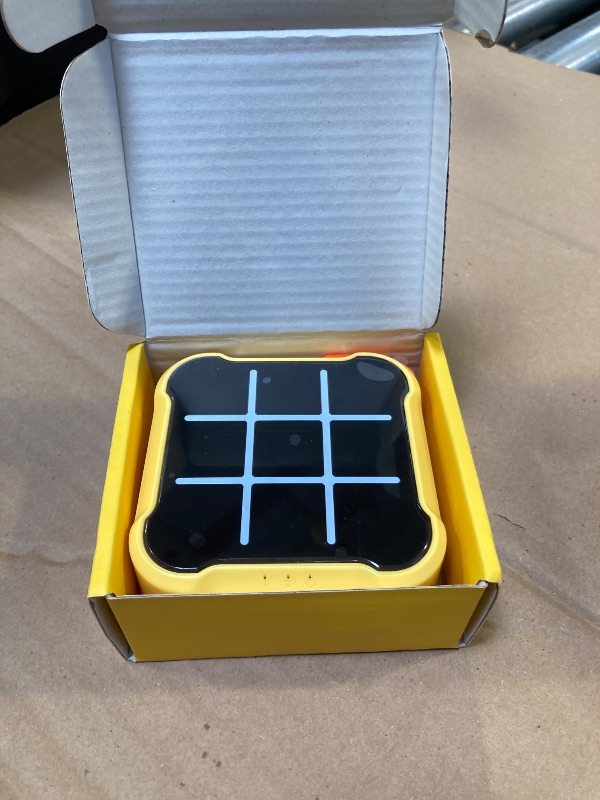 Photo 1 of Tic Tac Toe Game, 4 in 1 Handheld Educational Game Machine, Electronic Tic Tac Toe Game for Education and Memory Growth, Home, Toy Board Game for Kids and Adults (Yellow)