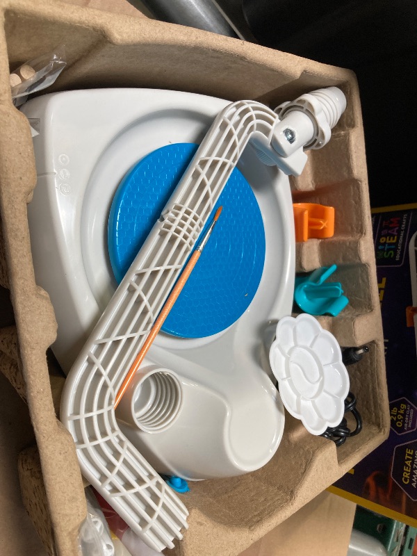 Photo 1 of NATIONAL GEOGRAPHIC Pottery Wheel for Kids – Complete Pottery Kit for Beginners, Plug-in Motor, 2 lbs. Air Dry Clay, Sculpting Clay Tools, Apron & More, Patented Design, Craft Kit (Amazon Exclusive)