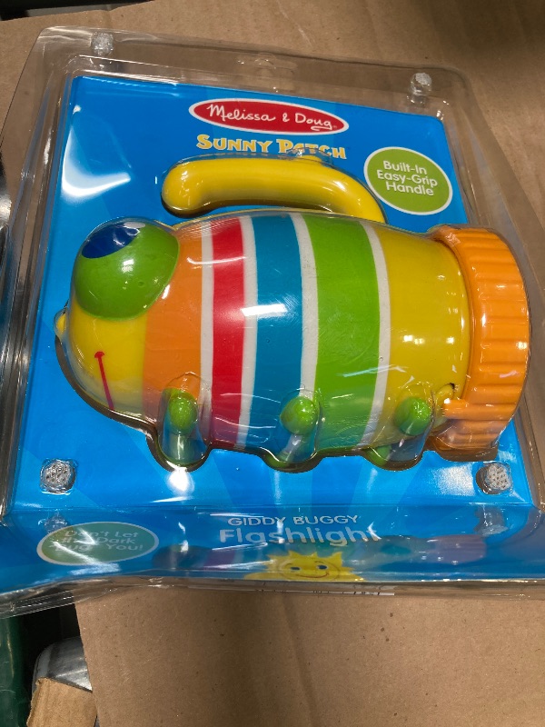 Photo 1 of Melissa & Doug Sunny Patch Giddy Buggy Flashlight with Easy-Grip Handle