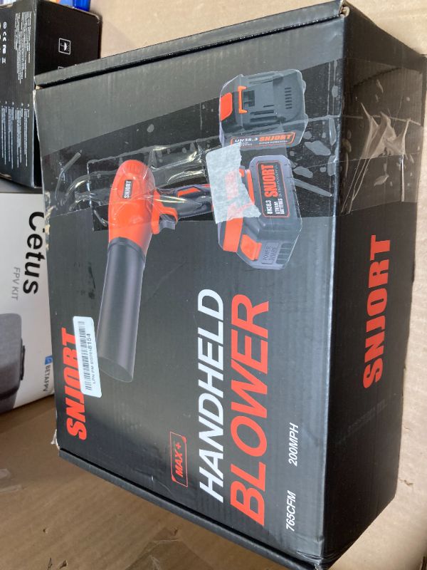 Photo 1 of Leaf Blower Cordless with Battery and Charger,500,000 RPM,Extended Nozzle,Lightweight Handheld Design,Blower for Patio Cleaning,car Blowing Water,Blowing Leaves and Dust (Bright Orange
