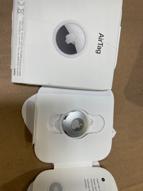 Photo 1 of Apple AirTag. Keep Track of and find Your Keys, Wallet, Luggage, Backpack, and More. Simple one-tap Set up with iPhone or iPad