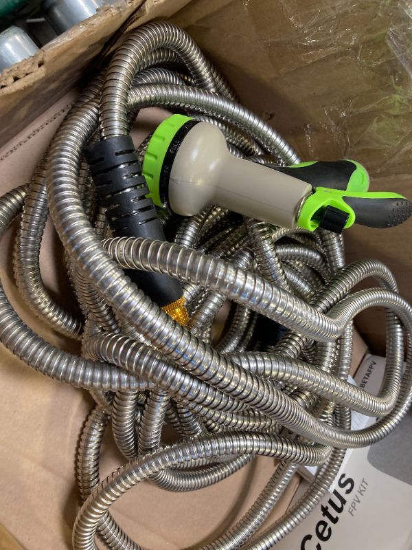 Photo 1 of Garden Hose 50 ft, Stainless Steel Water Hose with 10 Function Nozzle Flexible, Heavy Duty, Lightweight, No-Kink, Pet Proof, Puncture Proof Hose Metal for Yard, Outdoor