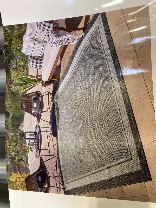 Photo 1 of 7'10"X10' INDOOR OUTDOOR AREA RUG 