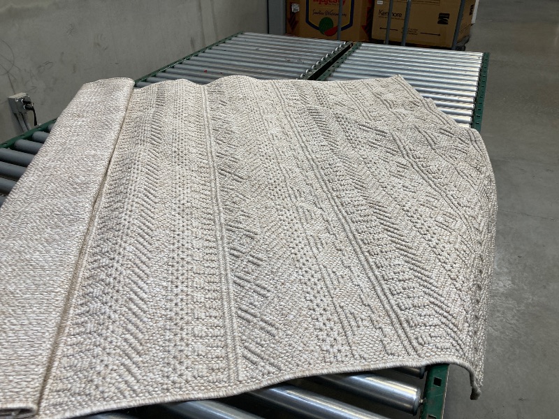 Photo 1 of 5'3"X7' AREA RUG 