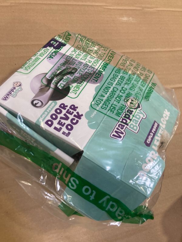 Photo 1 of Door Lever Lock (3 Pack) Prevents Toddlers from Opening Doors. 3.25" L * 1.5" W * 4.5" H Easy One Hand Operation for Adults. Durable ABS with 3M Adhesive Backing. Simple Install, No Tools Needed.