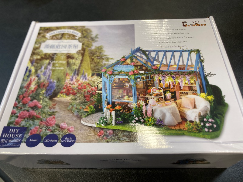 Photo 1 of CUTEBEE Dollhouse Miniature House with Furniture, DIY Dollhouse Kit with Dust Proof, Music Movement, 1:24 Scale Creative Room for Gift for Family and Friends (Rose Garden Tea House)