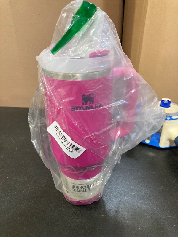 Photo 1 of STANLEY Quencher H2.0 Tumbler with Handle and Straw 40 oz | Flowstate 3-Position Lid | Cup Holder Compatible for Travel | Insulated Stainless Steel Cup | BPA-Free | Fuchsia