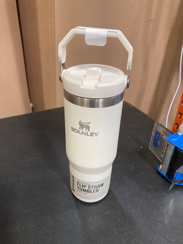 Photo 1 of STANLEY IceFlow Stainless Steel Tumbler with Straw - Vacuum Insulated Water Bottle for Home, Office or Car - Reusable Cup with Straw Leak Resistant Flip - Cold for 12 Hours or Iced for 2 Days (Cream)