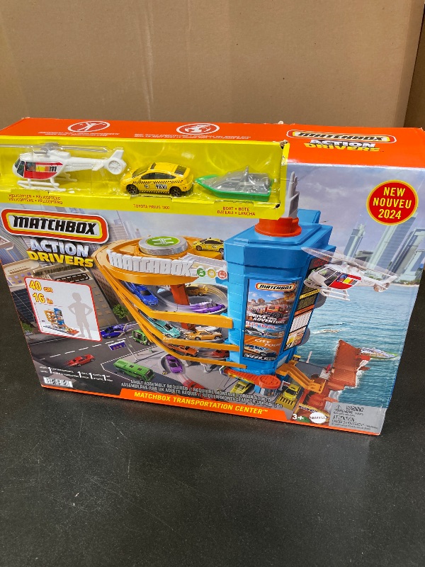 Photo 1 of Matchbox Toy Vehicles & Playset, Transportation Center with 5 Levels, Kid- & Car-Activated Features, 1:64 Scale Taxi, Boat & Helicopter & Food Vendor