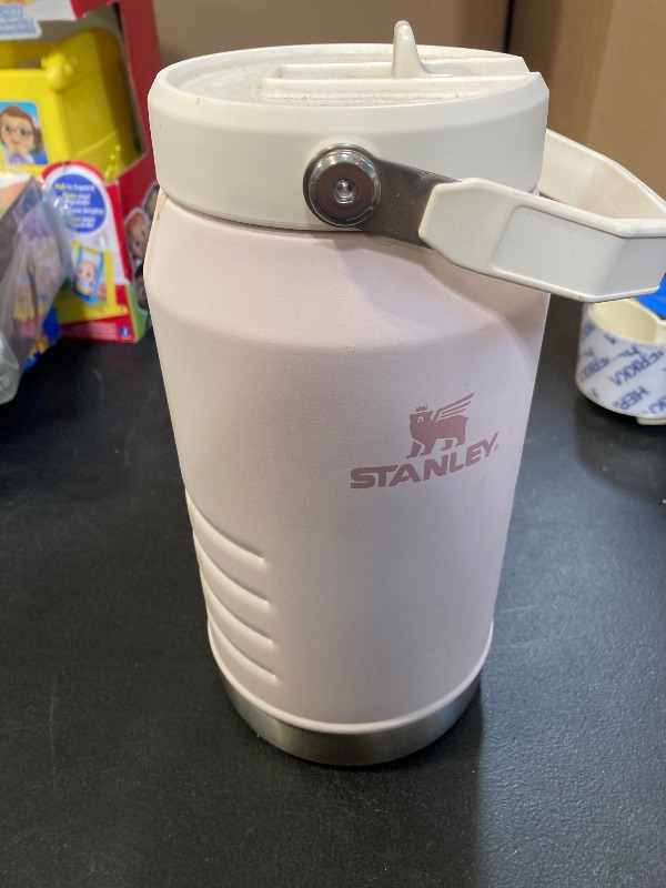 Photo 1 of Stanley IceFlow Flip Straw Jug with Handle 64 oz| Twist On Lid and Flip Up Straw | Leak Resistant for Travel and Sports | Insulated Stainless Steel | BPA-Free | Rose Quartz