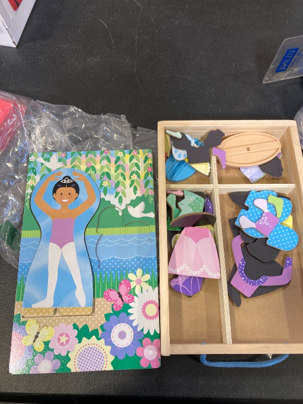 Photo 1 of Melissa & Doug Ballerina And Fairy Magnetic Dress-Up Double-Sided Wooden Doll And Swan Pretend Play Set (52 pcs)