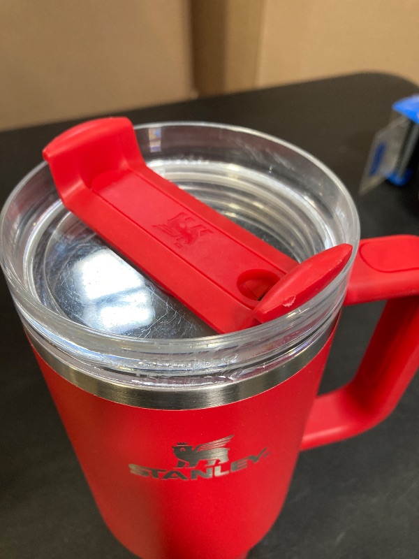 Photo 1 of STANLEY Quencher H2.0 Tumbler with Handle and Straw 40 oz | Flowstate 3-Position Lid | Cup Holder Compatible for Travel | Insulated Stainless Steel Cup | BPA-Free | Chili Red