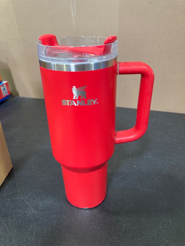 Photo 1 of STANLEY Quencher H2.0 Tumbler with Handle and Straw 40 oz | Flowstate 3-Position Lid | Cup Holder Compatible for Travel | Insulated Stainless Steel Cup | BPA-Free | Chili Red