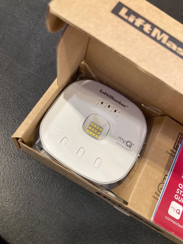 Photo 1 of Liftmaster myQ Smart Garage Control - Wireless Garage Hub and Sensor with WiFi & Bluetooth - Smartphone Controlled, 821LMC-S, White