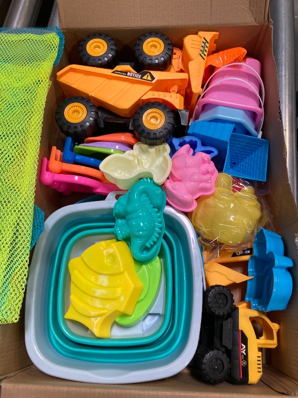 Photo 1 of FHOZGECY Beach Toys, 35Pcs Sand Toys with 3 Construction Vehicles, 3 Collapsible Beach Bucket, Sand Castle Building Kit, Sand Molds, Shovel Set, Mesh Bag, Travel Toys for Toddlers Kids Boys Girls