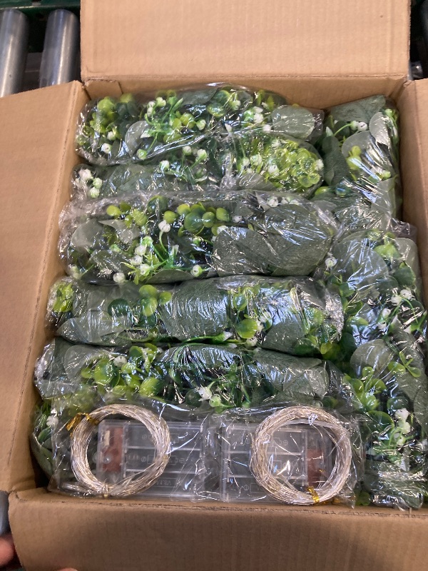 Photo 1 of 8Pcs Eucalyptus Garland with Lights, Greenery Garland, Green Garland with Flowers, 5.9FT Artificial Faux Eucalyptus Leaves Vines for Table Mantle Home Wedding Party Indoor Outdoor Decor