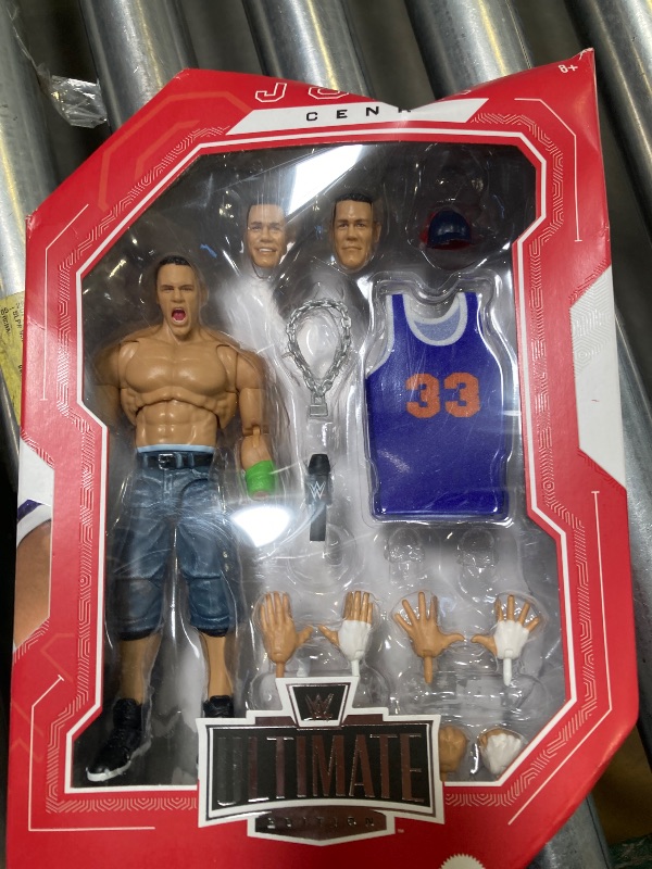 Photo 1 of Mattel WWE Ultimate Edition John Cena 6-inch Action Figure & Accessories Set, 10+ Pieces Include Swappable Heads & Hands (Amazon Exclusive)