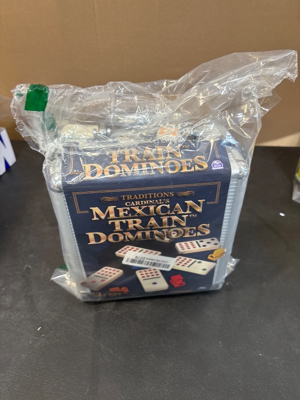 Photo 1 of Spin Master Games, Mexican Train Dominoes Set in Aluminum Carry Case, Includes Colorful Trains for Fun-Filled Family Game Night, for Kids & Family, 2-8 Players, for Ages 8 & Up