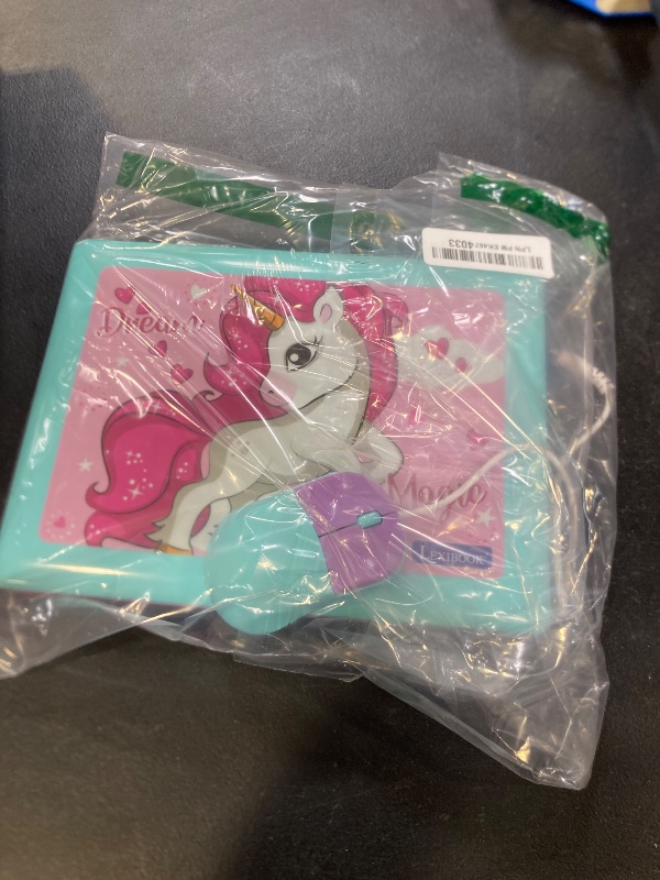 Photo 1 of LEXiBOOK - Unicorn Educational and Bilingual Laptop Spanish/English - Toy for Children with 124 Activities to Learn Mathematics, Dactylography, Logic, Clock Reading, Play Games and Music - JC598UNIi2