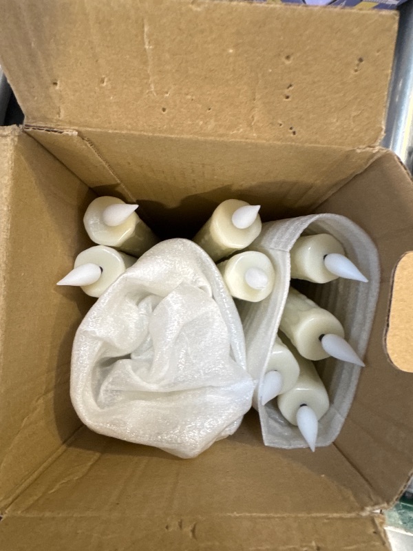 Photo 1 of Homemory 12 Pcs Real Wax Flameless Taper Candles with Remote Timer and Dimmer, Battery Operated Candlesticks with Flickering Light, Ivory Window Candles, 9.6 Inches for Wedding Home Decor